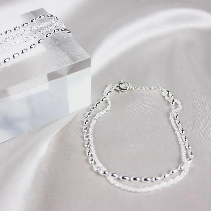 Amparo - Conjunto de Pulseiras Prateadas Elegantes com Pedras de Zircónio - | Benedita Lisboa
