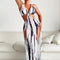 Fato de Banho e Vestido de Praia com Decote Halter e Estampado Tie-Dye - | Benedita Lisboa