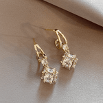LuzDour Brincos Elegantes com Zircônias em Ouro - Exclusivos - | Benedita Lisboa